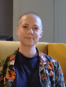 Photo of Mathie Douchy smiling at the camera